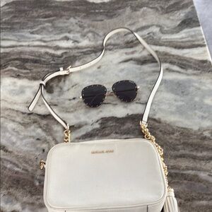 Michael Kors Cream Crossbody Bag with Black Sunglasses